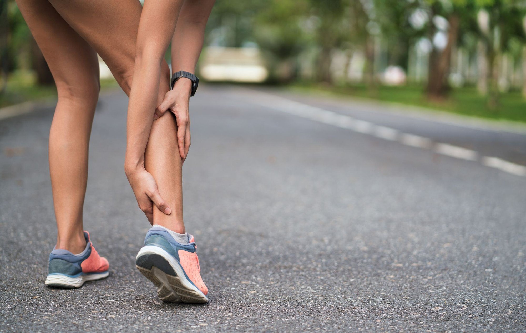 achilles-injury-on-running-outdoors-women-holding-royalty-free-image-1653508715